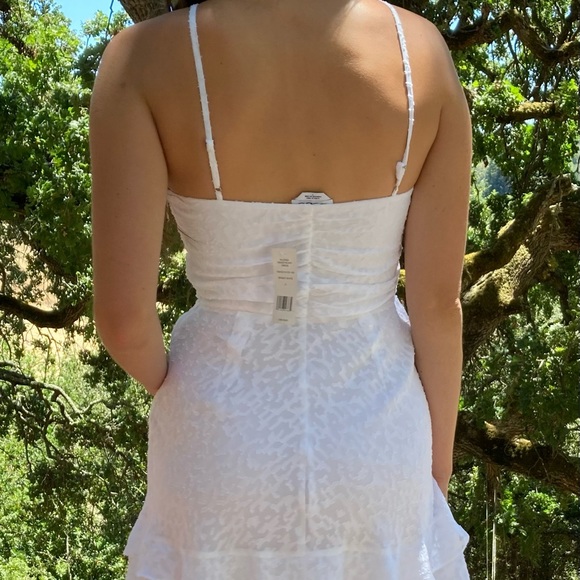 Bebe! Flirty white eyelet sundress perfect for a date night or concert! - Picture 3 of 7